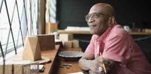 An elderly man looking thoughtful